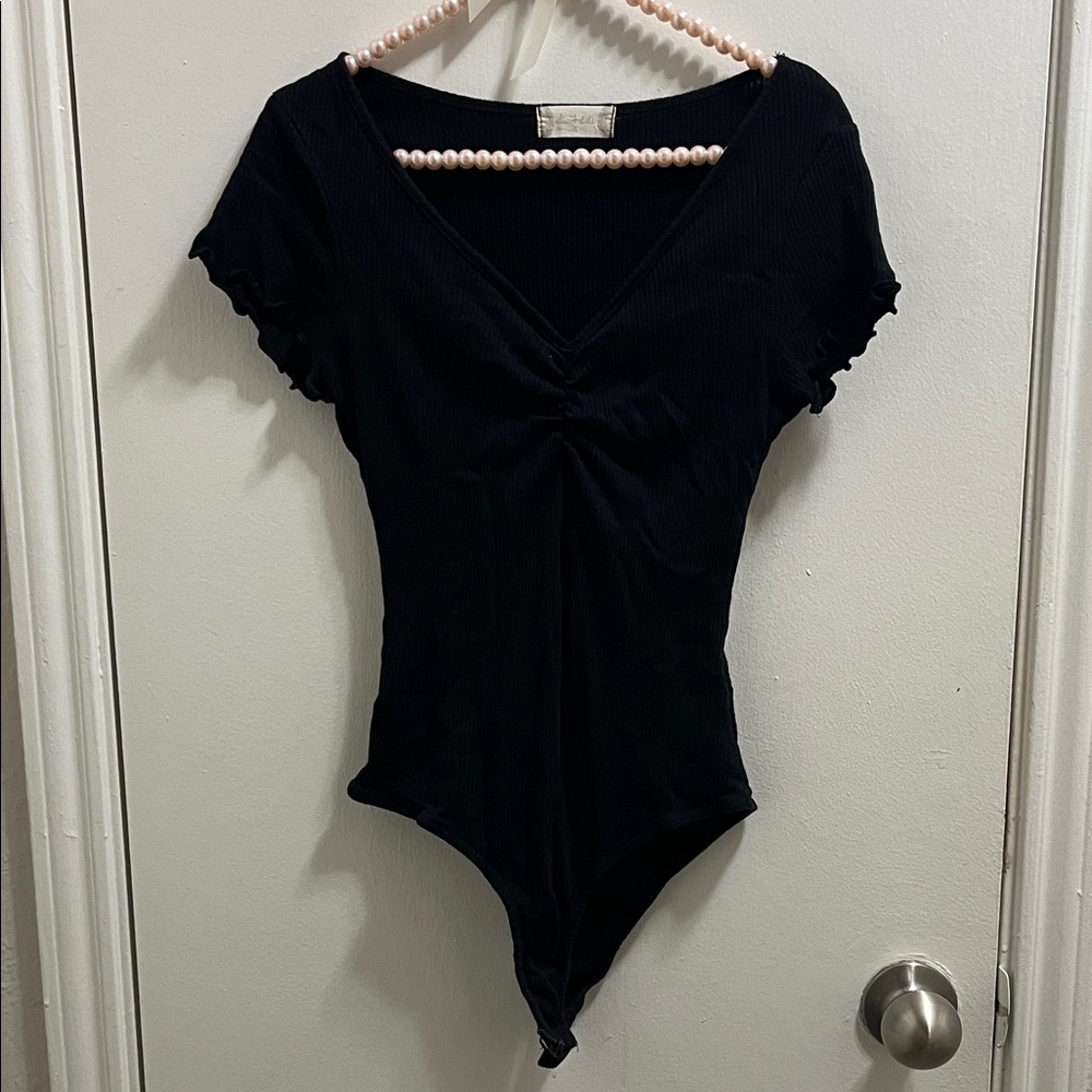 Black V-Neck Ribbed Short Sleeve Bodysuit Altar’d State